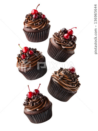 Multiple chocolate cupcakes with swirled frosting, cherries, and sprinkles on white background, concept of dessert variety Multiple chocolate cupcakes with swirled frosting, cherries, and sprinkles on white background, concept of dessert variety 136965644