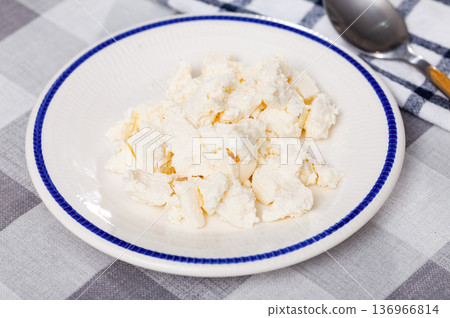 View of appetizing young cheese on plate View of appetizing young cheese on plate 136966814