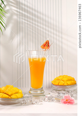 Frozen mojito with tequila, lemon, and ice, lemonade, or juice with mango slices, bar and party concept, restaurant and cafe advertising card, restaurant menu, house party advertising banner. Frozen mojito with tequila, lemon, and ice, lemonade, or juice with mango slices, bar and party concept, restaurant and cafe advertising card, restaurant menu, house party advertising banner. 136967463