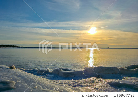Winter Sunset Over Icy Baltic Sea Coastline in Liepaja Latvia 136967785