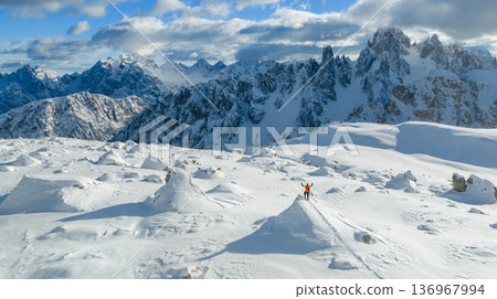 Beautiful Winter Mountain Scenery with Man on Cross-Country Skis , Aerial View Beautiful Winter Mountain Scenery with Man on Cross-Country Skis , Aerial View 136967994