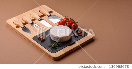 White French cream cheese Brie or Camembert for breakfast. Brie or Camembert cheese White French cream cheese Brie or Camembert for breakfast. Brie or Camembert cheese 136968678