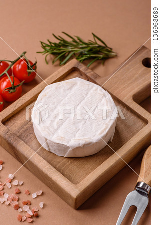 White French cream cheese Brie or Camembert for breakfast. Brie or Camembert cheese White French cream cheese Brie or Camembert for breakfast. Brie or Camembert cheese 136968689