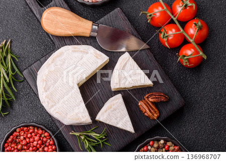White French cream cheese Brie or Camembert for breakfast. Brie or Camembert cheese White French cream cheese Brie or Camembert for breakfast. Brie or Camembert cheese 136968707