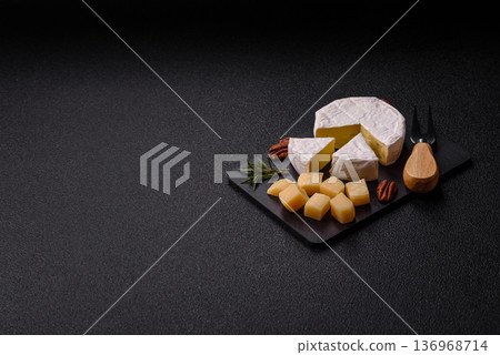 White French cream cheese Brie or Camembert for breakfast. Brie or Camembert cheese White French cream cheese Brie or Camembert for breakfast. Brie or Camembert cheese 136968714