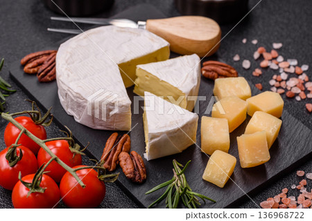 White French cream cheese Brie or Camembert for breakfast. Brie or Camembert cheese White French cream cheese Brie or Camembert for breakfast. Brie or Camembert cheese 136968722