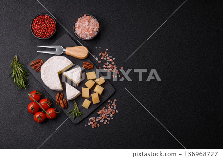 White French cream cheese Brie or Camembert for breakfast. Brie or Camembert cheese 136968727