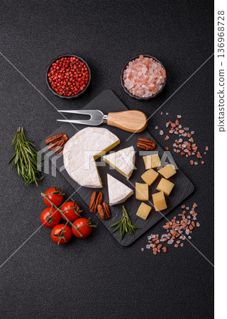 White French cream cheese Brie or Camembert for breakfast. Brie or Camembert cheese 136968728