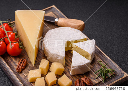 White French cream cheese Brie or Camembert for breakfast. Brie or Camembert cheese 136968738