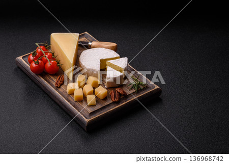 White French cream cheese Brie or Camembert for breakfast. Brie or Camembert cheese White French cream cheese Brie or Camembert for breakfast. Brie or Camembert cheese 136968742