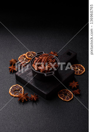Peeled and roasted pecan nut as an ingredient for healthy food. Pecan nut as a food background 136968765