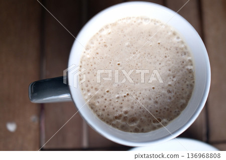 Hot Coffee Cup on Table with Natural Light Hot Coffee Cup on Table with Natural Light 136968808