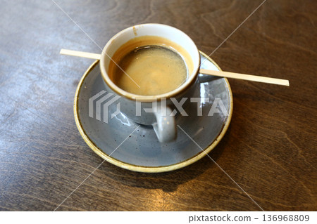 Hot Coffee Cup on Table with Natural Light 136968809