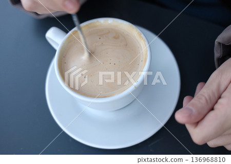 Hot Coffee Cup on Table with Natural Light 136968810