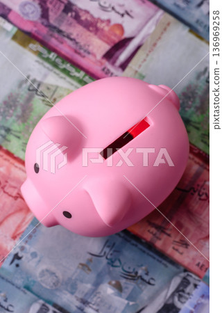 A piggy bank as a concept for storing, accumulating, and saving financial resources. A piggy bank A piggy bank as a concept for storing, accumulating, and saving financial resources. A piggy bank 136969258