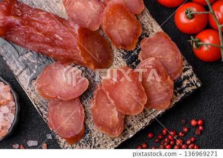Sliced smoked dry sausage made from turkey or pork for sandwiches. Sliced smoked sausage 136969271