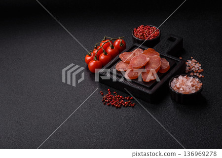 Sliced smoked dry sausage made from turkey or pork for sandwiches. Sliced smoked sausage Sliced smoked dry sausage made from turkey or pork for sandwiches. Sliced smoked sausage 136969278