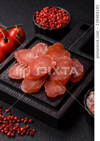 Sliced smoked dry sausage made from turkey or pork for sandwiches. Sliced smoked sausage Sliced smoked dry sausage made from turkey or pork for sandwiches. Sliced smoked sausage 136969285