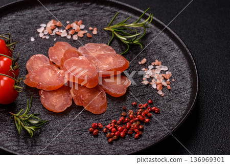 Sliced smoked dry sausage made from turkey or pork for sandwiches. Sliced smoked sausage 136969301