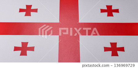 Georgia, the Georgian red and white flag as a symbol of independence and freedom. The Georgian flag Georgia, the Georgian red and white flag as a symbol of independence and freedom. The Georgian flag 136969729