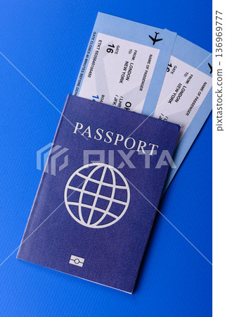 A passport with a foreign visa for flights, travel, and vacations abroad. An international passport A passport with a foreign visa for flights, travel, and vacations abroad. An international passport 136969777