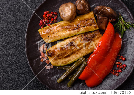 Vegetables. corn, bell peppers, zucchini, and mushrooms grilled or barbecued. Grilled vegetables 136970190