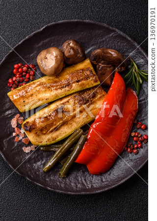 Vegetables. corn, bell peppers, zucchini, and mushrooms grilled or barbecued. Grilled vegetables Vegetables. corn, bell peppers, zucchini, and mushrooms grilled or barbecued. Grilled vegetables 136970191