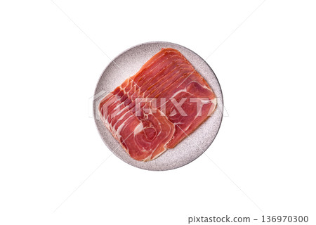 Meat, ham, jamon, or prosciutto sliced for breakfast bruschetta. Sliced ham, jamon, or prosciutto 136970300