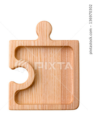 Wooden empty puzzle serving tray, kitchen accessories. A wooden empty puzzle tray 136970302