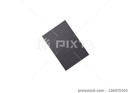 A black slate stone board or plate, an empty kitchen utensil. A black slate board A black slate stone board or plate, an empty kitchen utensil. A black slate board 136970305