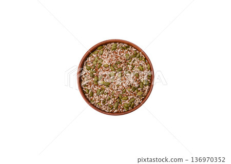 Shelled sunflower, sesame, pumpkin, and flaxseed kernels as ingredients for healthy food Shelled sunflower, sesame, pumpkin, and flaxseed kernels as ingredients for healthy food 136970352