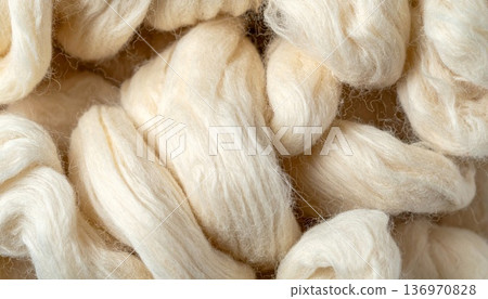 Pile of Soft White Wool Yarn Fibers Texture Background Close Up Studio Shot 136970828