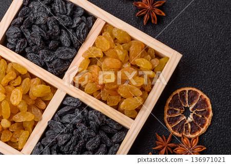 Sweet, dry, golden or yellow raisin made from grapes are a healthy, nutritious food. Golden raisins Sweet, dry, golden or yellow raisin made from grapes are a healthy, nutritious food. Golden raisins 136971021