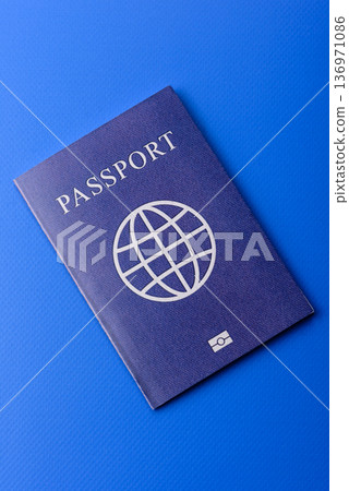 A passport with a foreign visa for flights, travel, and vacations abroad. An international passport A passport with a foreign visa for flights, travel, and vacations abroad. An international passport 136971086