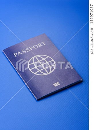 A passport with a foreign visa for flights, travel, and vacations abroad. An international passport 136971087