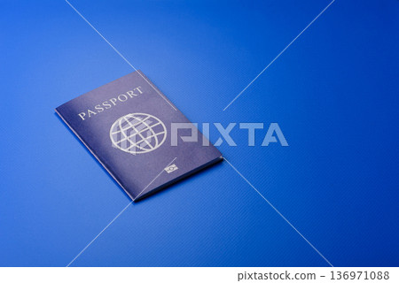 A passport with a foreign visa for flights, travel, and vacations abroad. An international passport A passport with a foreign visa for flights, travel, and vacations abroad. An international passport 136971088