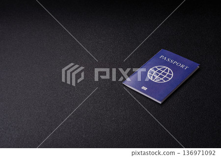 A passport with a foreign visa for flights, travel, and vacations abroad. An international passport 136971092