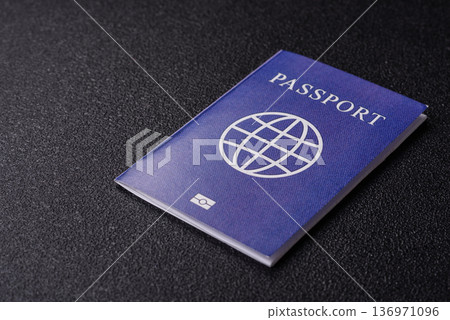 A passport with a foreign visa for flights, travel, and vacations abroad. An international passport 136971096