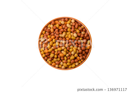 Food, nuts coated with salt and paprika, peanuts as a source of protein. Salted peanuts 136971117
