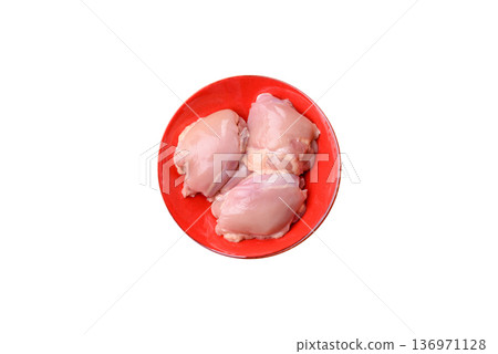 Chicken thigh fillet, skinless and boneless meat for grilling or barbecue. Chicken thigh fillet 136971128