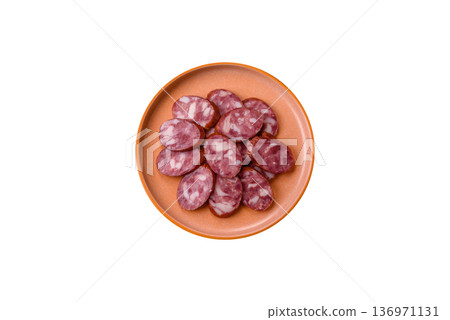 Smoked salami, thin beef or pork sausage, meat snacks. Salami sausage Smoked salami, thin beef or pork sausage, meat snacks. Salami sausage 136971131