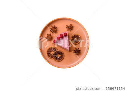 Raspberry or strawberry cheesecake, a slice of sweet red cake with berries. Raspberry cheesecake Raspberry or strawberry cheesecake, a slice of sweet red cake with berries. Raspberry cheesecake 136971134