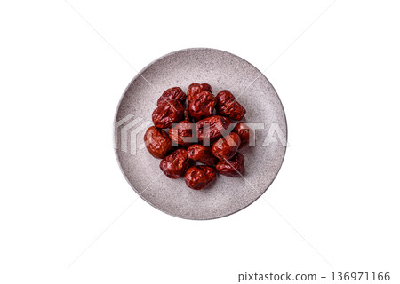 Red dried dates, the Chinese sweet fruit jujube, as a healthy food. Red dates, jujube Red dried dates, the Chinese sweet fruit jujube, as a healthy food. Red dates, jujube 136971166
