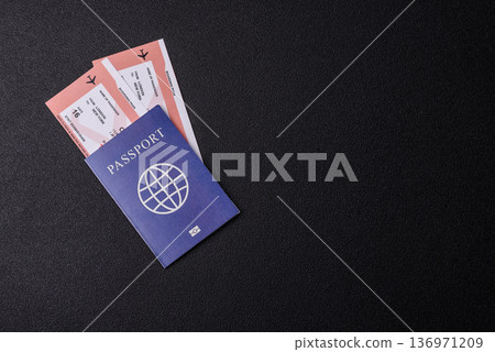 A passport with a foreign visa for flights, travel, and vacations abroad. An international passport A passport with a foreign visa for flights, travel, and vacations abroad. An international passport 136971209