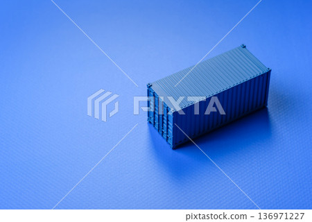 A cargo container in a port warehouse as a logistics element, export. A cargo container A cargo container in a port warehouse as a logistics element, export. A cargo container 136971227