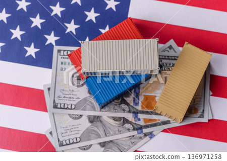Cargo containers on the US flag as a conceptual backdrop for goods export and logistics. Cargo containers 136971258