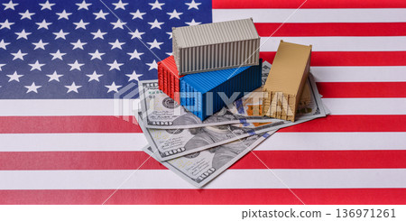 Cargo containers on the US flag as a conceptual backdrop for goods export and logistics. Cargo containers Cargo containers on the US flag as a conceptual backdrop for goods export and logistics. Cargo containers 136971261