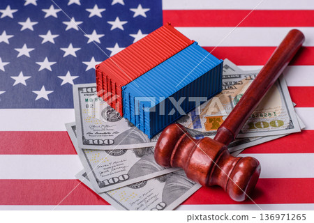 The cargo container ban on the US flag as a conceptual backdrop. The cargo container embargo The cargo container ban on the US flag as a conceptual backdrop. The cargo container embargo 136971265