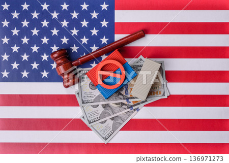 The cargo container ban on the US flag as a conceptual backdrop. The cargo container embargo 136971273