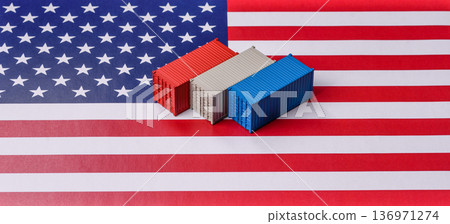 Cargo containers on the US flag as a conceptual backdrop for goods export and logistics. Cargo containers 136971274